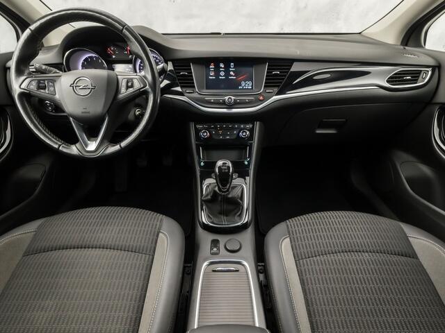 Opel ASTRA 1.2 Blitz Edition (APPLE CARPLAY, NAVIGATIE, STUUR/STOELVERWARMING, CLIMATE, CAMERA, SPORTSTOELEN, GETINT GLAS, ADAPTIVE CRUISE, NIEUWSTAAT)