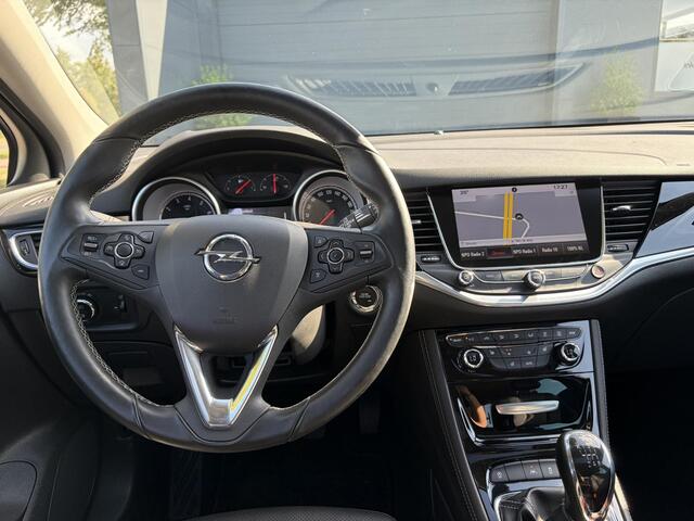 Opel ASTRA 1.4 Innovation 1e Eigenaar,Elektrisch Schuifdak,Trekhaak,Camera,Carplay,Dealer Onderhouden,Stoelverw-Stuurverw,6 Bak,150pk,Dodehoek,Pdc V+A,Rijstrooksensor,LED,Clima,Cruise,Leder,Recent beurt gehad,N.A.P,Apk tot 04-2027