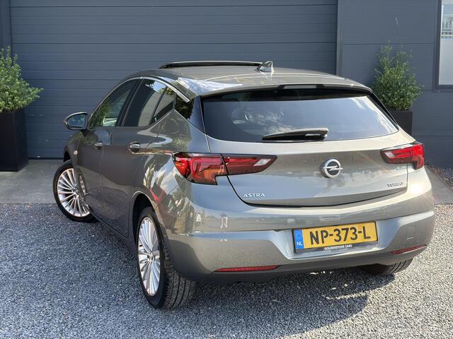 Opel ASTRA 1.4 Innovation 1e Eigenaar,Elektrisch Schuifdak,Trekhaak,Camera,Carplay,Dealer Onderhouden,Stoelverw-Stuurverw,6 Bak,150pk,Dodehoek,Pdc V+A,Rijstrooksensor,LED,Clima,Cruise,Leder,Recent beurt gehad,N.A.P,Apk tot 04-2027