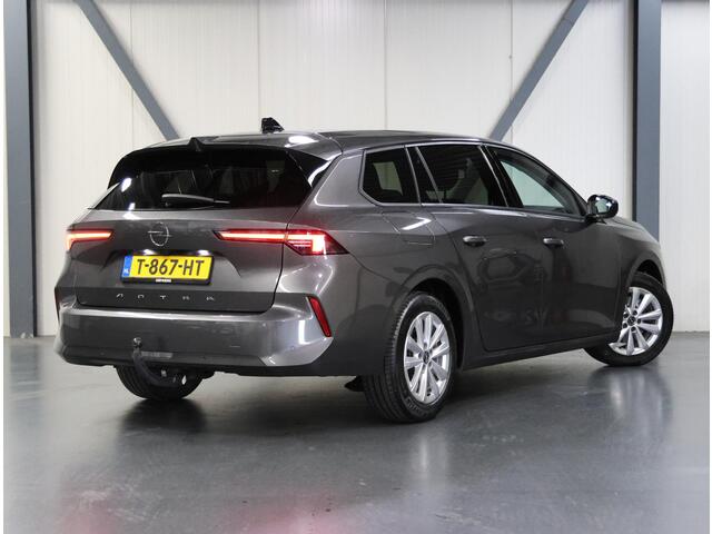 Opel ASTRA ST 130PK Edition | 1ste eigenaar | Trekhaak | Camera | Stoel/stuurverwarming | AppleCarPlay/AndroidAuto | Armsteun | Climate Control | Cruise Control | LED | Isofix | Privacy Glass | Parkeersensoren |