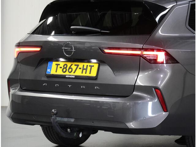 Opel ASTRA ST 130PK Edition | 1ste eigenaar | Trekhaak | Camera | Stoel/stuurverwarming | AppleCarPlay/AndroidAuto | Armsteun | Climate Control | Cruise Control | LED | Isofix | Privacy Glass | Parkeersensoren |