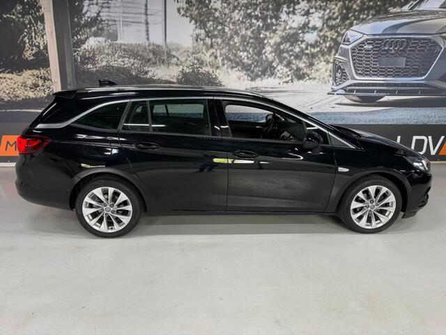 Opel ASTRA 1.4 INNOVATION / Camera / PDC / Apple Carplay / PArkeerhulp / Trekhaak / Cruise control / Boekjes en historie aanwezig.