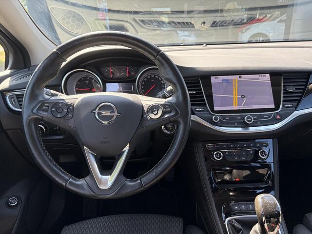Opel ASTRA Sports Tourer 1.4 Business Executive 2e Eigenaar l 150pk l Carplay l Navi l Pdc V+A l Stoelvw-Stuurverw l Clima l Cruise l 18''Lmv l Halfleder l 6 Bak l Rijstrooksensor l N.A.P l Apk tot 08-2027