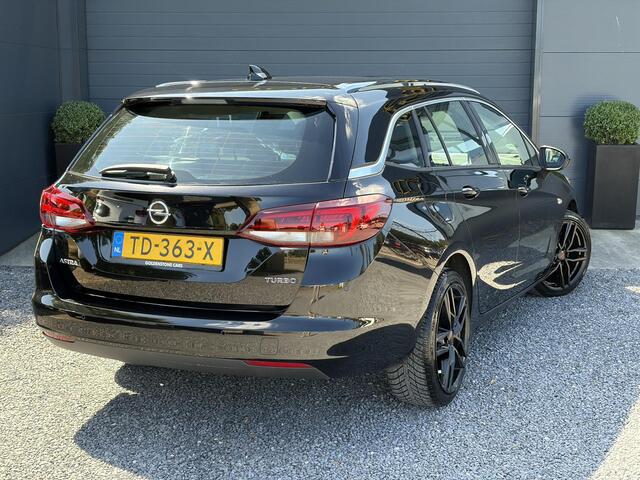 Opel ASTRA Sports Tourer 1.4 Business Executive 2e Eigenaar l 150pk l Carplay l Navi l Pdc V+A l Stoelvw-Stuurverw l Clima l Cruise l 18''Lmv l Halfleder l 6 Bak l Rijstrooksensor l N.A.P l Apk tot 08-2027