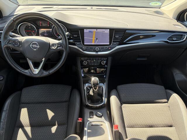 Opel ASTRA Sports Tourer 1.4 Business Executive 2e Eigenaar l 150pk l Carplay l Navi l Pdc V+A l Stoelvw-Stuurverw l Clima l Cruise l 18''Lmv l Halfleder l 6 Bak l Rijstrooksensor l N.A.P l Apk tot 08-2027