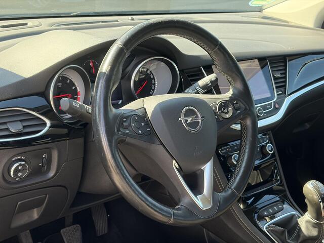 Opel ASTRA Sports Tourer 1.4 Business Executive 2e Eigenaar l 150pk l Carplay l Navi l Pdc V+A l Stoelvw-Stuurverw l Clima l Cruise l 18''Lmv l Halfleder l 6 Bak l Rijstrooksensor l N.A.P l Apk tot 08-2027
