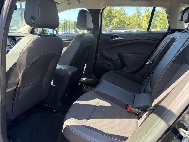 Opel ASTRA Sports Tourer 1.4 Business Executive 2e Eigenaar l 150pk l Carplay l Navi l Pdc V+A l Stoelvw-Stuurverw l Clima l Cruise l 18''Lmv l Halfleder l 6 Bak l Rijstrooksensor l N.A.P l Apk tot 08-2027