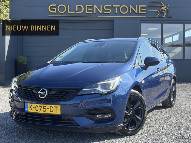 Opel ASTRA Sports Tourer 1.2 Ultimate 2e Eigenaar l Trekhaak l Camera l Carplay l Navi l Alcantara-Leder l 17''Lmv l Stoelverw-Stuurverw l Net beurt gehad l Dodehoek l Rijstrooksensor l Pdc V+A l 6 Bak l N.A.P l 146pk l Bj 11-2020 l Apk tot 08-2028