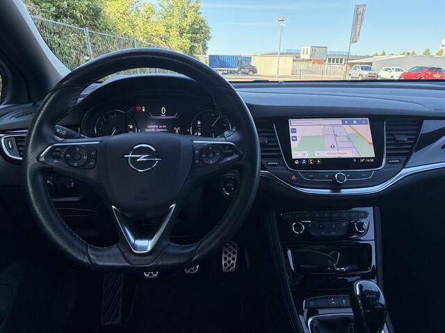 Opel ASTRA Sports Tourer 1.2 Ultimate 2e Eigenaar l Trekhaak l Camera l Carplay l Navi l Alcantara-Leder l 17''Lmv l Stoelverw-Stuurverw l Net beurt gehad l Dodehoek l Rijstrooksensor l Pdc V+A l 6 Bak l N.A.P l 146pk l Bj 11-2020 l Apk tot 08-2028