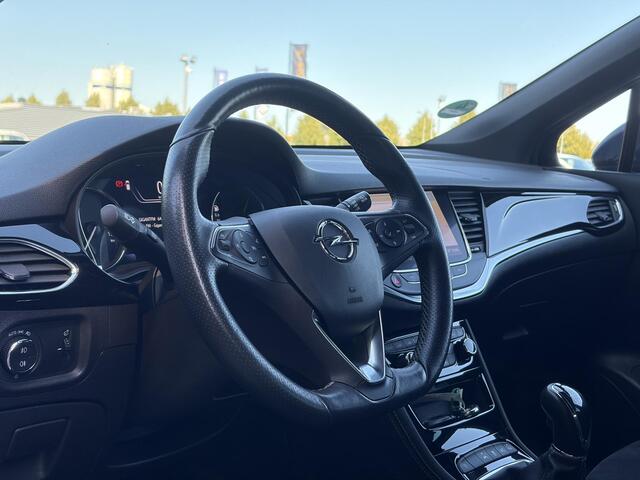 Opel ASTRA Sports Tourer 1.2 Ultimate 2e Eigenaar l Trekhaak l Camera l Carplay l Navi l Alcantara-Leder l 17''Lmv l Stoelverw-Stuurverw l Net beurt gehad l Dodehoek l Rijstrooksensor l Pdc V+A l 6 Bak l N.A.P l 146pk l Bj 11-2020 l Apk tot 08-2028