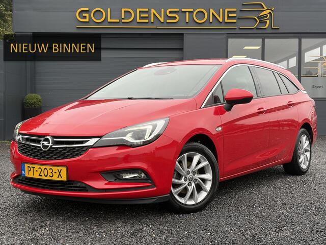 Opel ASTRA Sports Tourer 1.4 Innovation Dealer Onderhouden l 150pk l Carplay l 2e Eigenaar l Camera l Trekhaak l Keyless l Navi l Halfleder l Pdc V+A l 6 Bak l Clima l Cruise l Rijstrooksensor l Dodehoeksensor l N.A.P l Apk tot 01-2027