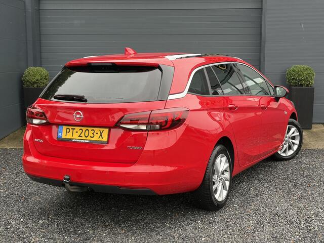 Opel ASTRA Sports Tourer 1.4 Innovation Dealer Onderhouden l 150pk l Carplay l 2e Eigenaar l Camera l Trekhaak l Keyless l Navi l Halfleder l Pdc V+A l 6 Bak l Clima l Cruise l Rijstrooksensor l Dodehoeksensor l N.A.P l Apk tot 01-2027