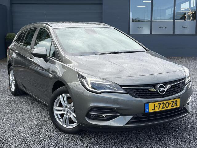Opel ASTRA 1.2 Business Edition 147pk l 2e Eigenaar l Trekhaak l Navi l Carplay l 6 Bak l Clima l Cruise l Pdc V+A l Recent beurt gehad l Lm velgen l N.A.P l Apk tot 07-2028