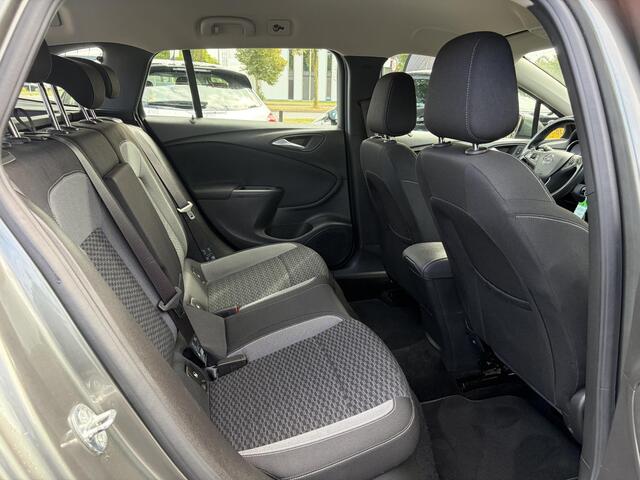 Opel ASTRA 1.2 Business Edition 147pk l 2e Eigenaar l Trekhaak l Navi l Carplay l 6 Bak l Clima l Cruise l Pdc V+A l Recent beurt gehad l Lm velgen l N.A.P l Apk tot 07-2028