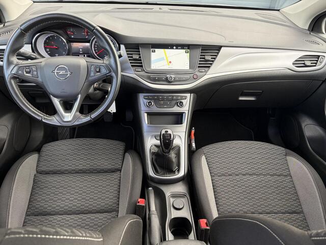 Opel ASTRA Sports Tourer 1.2 Edition ?Camera ?110pk?2e Eigenaar?Carplay?Navi?Airco?Cruise?Pdc?LED koplampen?N.A.P.?6 Bak?Pdc V+A?Lm velgen?Dakdragers ?Comfortstoelen?Bj 11-2020?Apk tot 07-2028
