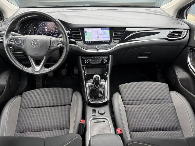 Opel ASTRA Sports Tourer 1.2 Elegance ?131pk?2e Eigenaar?Camera?Carplay?6 Bak?Stoelverw?Stuurverw?Pdc V+A?Recent beurt gehad?Clima?Cruise?Halfleder?Keyless?N.A.P?Lm velgen?Rijstrooksensor?Apk tot 09-2028