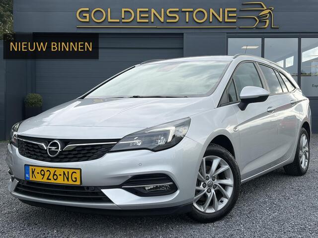Opel ASTRA Sports Tourer 1.2 Business Executive ?1e Eigenaar?146pk?Camera?Trekhaak?Carplay?Airco?Cruise?Pdc V+A?Lm velgen?Comfortstoelen?6 Bak?N.A.P?Nieuwe Apk bij Aflevering