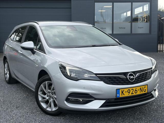 Opel ASTRA Sports Tourer 1.2 Business Executive ?1e Eigenaar?146pk?Camera?Trekhaak?Carplay?Airco?Cruise?Pdc V+A?Lm velgen?Comfortstoelen?6 Bak?N.A.P?Nieuwe Apk bij Aflevering