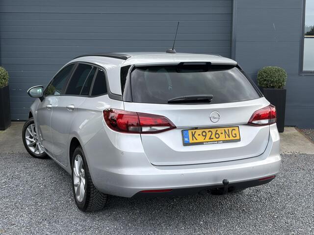 Opel ASTRA Sports Tourer 1.2 Business Executive ?1e Eigenaar?146pk?Camera?Trekhaak?Carplay?Airco?Cruise?Pdc V+A?Lm velgen?Comfortstoelen?6 Bak?N.A.P?Nieuwe Apk bij Aflevering