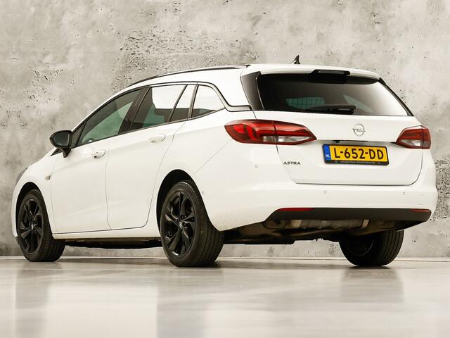 Opel ASTRA Sports Tourer 1.4 Ultimate 145Pk Automaat (VIRTUAL COCKPIT, APPLE CARPLAY, GROOT NAVI, LEDER/ALCANTARA, CAMERA, SPORTSTOELEN, GETINT GLAS, ZWART HEMEL, ADAPTIVE CRUISE, NIEUWSTAAT)