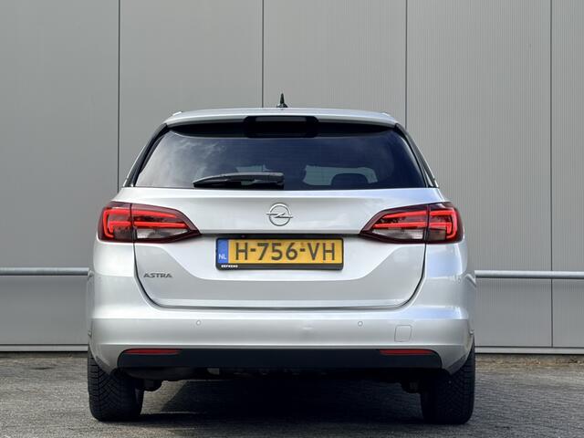 Opel ASTRA Sports Tourer 1.2 - airco - nap! - navi - cruise - camera