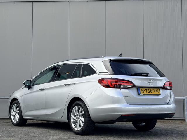 Opel ASTRA Sports Tourer 1.2 - airco - nap! - navi - cruise - camera