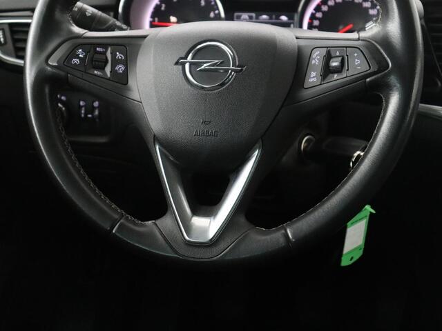 Opel ASTRA Sports Tourer 1.2 Design & Tech | Cruise control | Camera | Park assist | Trekhaak | Dodehoek detectie | Navigatie | Carplay | Climate control | 16" velgen