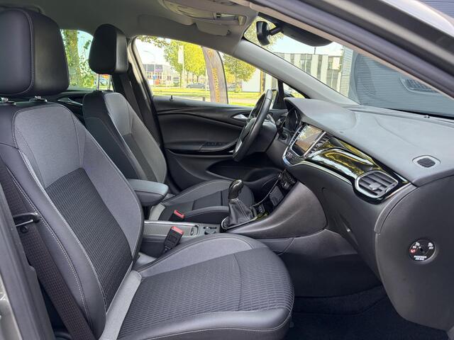 Opel ASTRA Sports Tourer 1.2 Business Elegance ?1e Eigenaar?110pk?Carplay?Camera?Navi?Clima?Cruise?Halfleder?Comfortstoel?Pdc V+A?6 Bak?Dealer Onderhouden?Keyless?Lm velgen?N.A.P?Apk tot 06-2027
