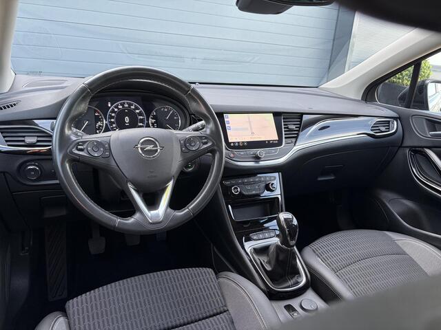 Opel ASTRA Sports Tourer 1.2 Business Elegance ?1e Eigenaar?110pk?Carplay?Camera?Navi?Clima?Cruise?Halfleder?Comfortstoel?Pdc V+A?6 Bak?Dealer Onderhouden?Keyless?Lm velgen?N.A.P?Apk tot 06-2027