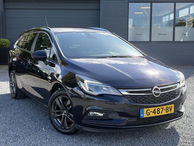 Opel ASTRA Sports Tourer 1.4 Turbo 120 Jaar Edition ?150pk?Carplay?Navi?Trekhaak?Pdc V+A?Clima?Cruise?6 Bak?Lm velgen?N.A.P?Apk tot 02-2028