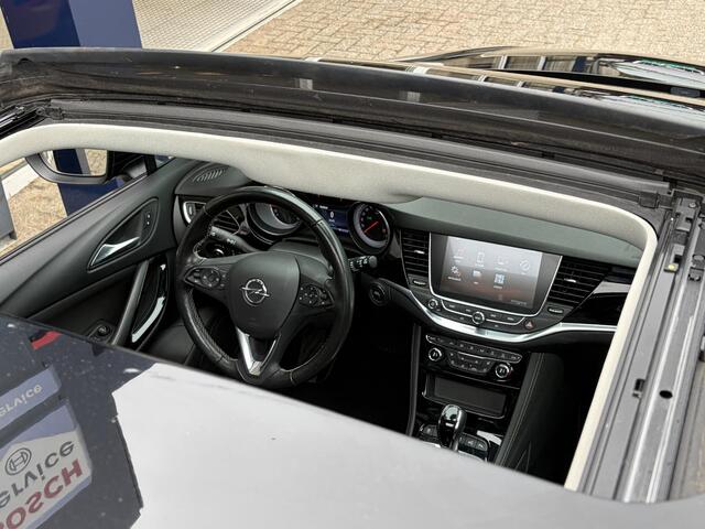 Opel ASTRA 1.6 Turbo Business Executive / Automaat / 200 PK / NL-Auto / Schuif-Kanteldak / Vol-Leder / Elektr.-Stoelen met Geheugen en Massagefunctie / Stuur & Stoelverwarming / Stoelverkoeling / Adaptieve Cruise-Control / Afneembare-Trekhaak / Apple-Carplay & Android-Auto / Keyless / DAB Radio-Bluetooth / Navi / PDC met Camera / 18'' LMV / All-Season / ENZ.