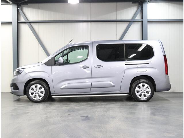 Opel COMBO TOUR 110PK L2H1 Edition | 1ste eigenaar | AppleCarplay/Android Auto | 7 persoons | Camera | Stuur verwarmd | 2 schuifdeuren | Armsteun | Navigatie | Airco | Isofix | Privacy Glass | Parkeersensoren |