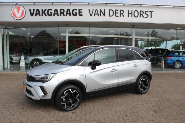 Opel Crossland 1.2-110pk Turbo 'Elegance'. Mooie en luxe hoogzitter met weinig km's ! Volautm. airco dual, cruise control, camera, comfortstoelen, metallic lak, LM wielen, navigatie, telefoonvoorb., lane- en side assist, parkeersensoren v+a, LED verlichting etc.