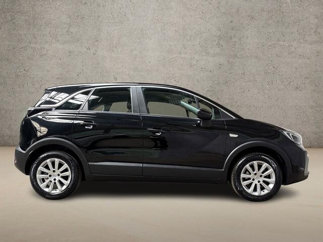 Opel Crossland 1.2 Turbo Elegance Automaat (APPLE CARPLAY, LEDER, CLIMATE, STUUR/STOELVERWARMING, SPORTSTOELEN, GETINT GLAS, LED KOPLAMPEN, NIEUWSTAAT)