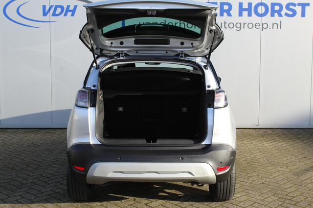 Opel Crossland 1.2-110pk Turbo 'Elegance'. Mooie en luxe hoogzitter met weinig km's ! Volautm. airco dual, cruise control, camera, comfortstoelen, metallic lak, LM wielen, navigatie, telefoonvoorb., lane- en side assist, parkeersensoren v+a, LED verlichting etc.
