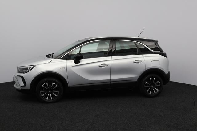 Opel Crossland 1.2 Turbo Level 4/ Two-Tone/ Trekhaak/ 16'' LMV/ Apple + Android/ Dode-Hoek DET./ Lane-Assist./ LED koplampen/ Camera/ Extra getint glas/ Cruise/ Multi. LEDER. Stuur.