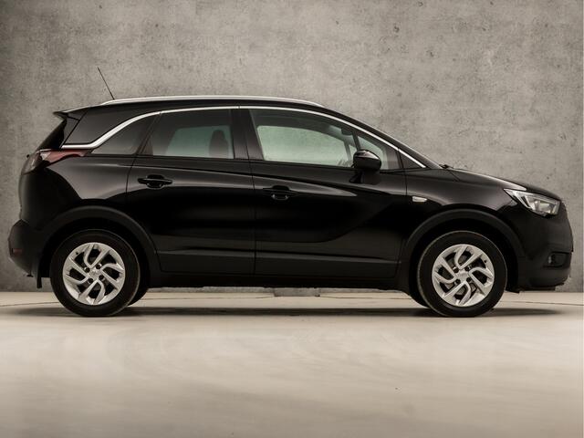 Opel Crossland X 1.2 Turbo Innovation (APPLE CARPLAY, GROOT NAVI, STUUR/STOELVERWARMING, CLIMATE, LEDER, SPORTSTOELEN, KEYLESS, 360 CAMERA, GETINT GLAS, PARKEERSENSOREN, NIEUWSTAAT)