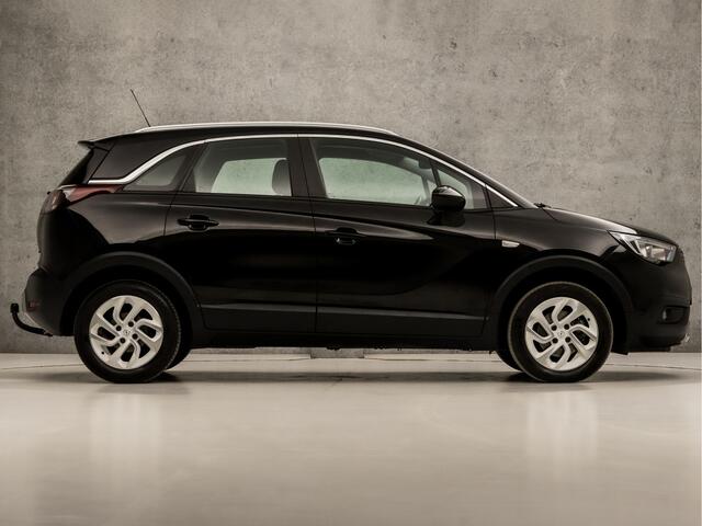 Opel Crossland X 1.2 Turbo Innovation Sport 131Pk (APPLE CARPLAY, GROOT NAVI, CLIMATE, KEYLESS, LM VELGEN, LEDER, SPORTSTOELEN, TREKHAAK, CRUISE, PARKEERSENSOREN, NIEUWE APK, NIEUWSTAAT)