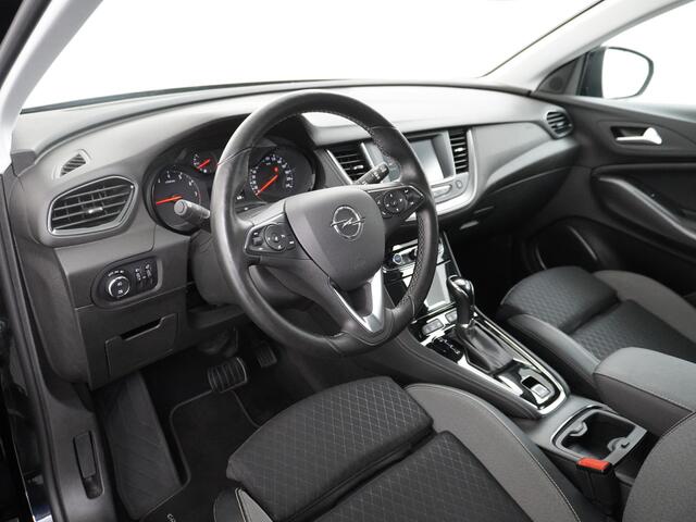 Opel Grandland X 1.2 Turbo Autom. AGR-Comfort Stoelen Verwarmd Trekhaak Apple Carplay Android Auto Navi Ecc Cruise control Pdc Verkeersbord detectie Regen/Lichtsensor Led Wifi Rijstrooksensor Business Executive