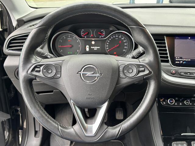 Opel Grandland X BWJ 2018 | 1.2T 131 PK Innovation | TREKHAAK | LEER | ELKETR. STOELEN | ELEKTR. ACHTERKLEP | CAMERA | STOEL + STUURVERW. | STOELVERKOEL. | LEDER | FULL LED | KEYLESS | CARPLAY + ANDROID | NAVI | CLIMA | CRUISE | LMV | PDC