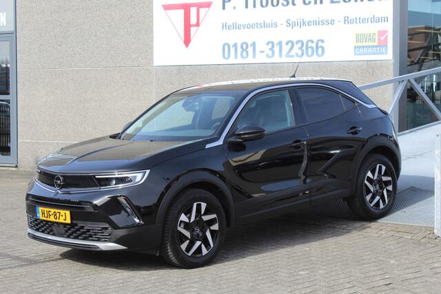 Opel MOKKA 1.2 Turbo Uniek!!Lage kilometerstand/AUTOMAAT/Navigatie/Cruise control/Climate control/Apple carplay/Achteruitrijcamera/Parkeersensoren/Lane assist/Stoelverwarming/Stuurverwarming/LED koplampen/17'' Lichtmetalen velgen/Spraakbediening.