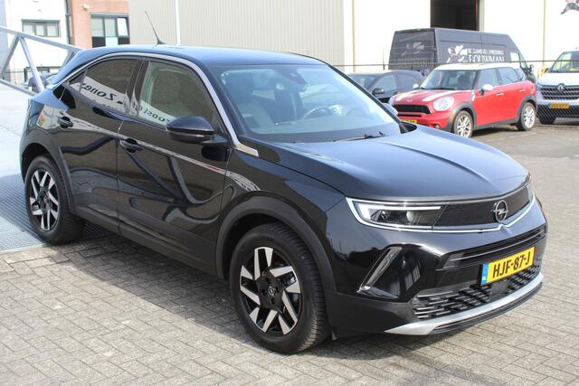 Opel MOKKA 1.2 Turbo Uniek!!Lage kilometerstand/AUTOMAAT/Navigatie/Cruise control/Climate control/Apple carplay/Achteruitrijcamera/Parkeersensoren/Lane assist/Stoelverwarming/Stuurverwarming/LED koplampen/17'' Lichtmetalen velgen/Spraakbediening.