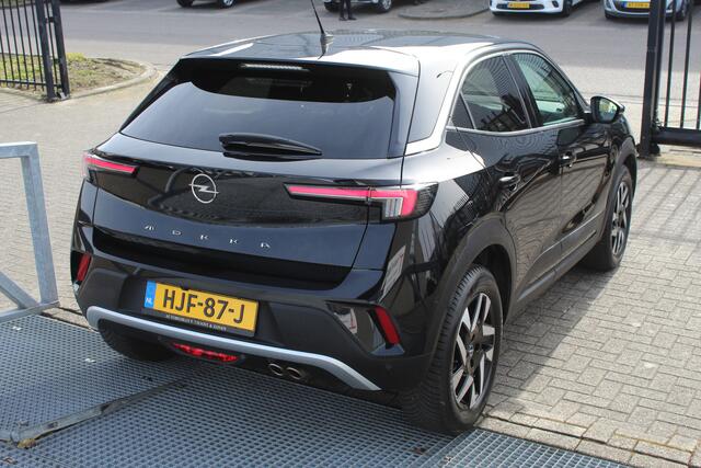 Opel MOKKA 1.2 Turbo Uniek!!Lage kilometerstand/AUTOMAAT/Navigatie/Cruise control/Climate control/Apple carplay/Achteruitrijcamera/Parkeersensoren/Lane assist/Stoelverwarming/Stuurverwarming/LED koplampen/17'' Lichtmetalen velgen/Spraakbediening.
