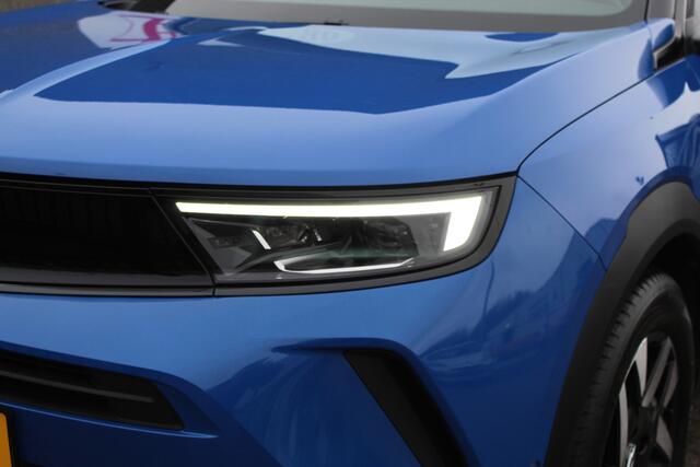 Opel MOKKA 1.2 Turbo Edition Virtueelcockpit XXL/Navigatie/Achteruitrijcamera/Apple carplay/Adaptive cruisecontrol/Stoelverwarming/Stuurverwarming/Parkeersensoren rondom/Led dagrijverlichting/Keyless/Privacyglas