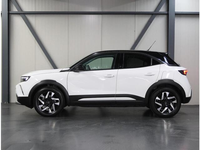 Opel MOKKA Mokka-e Elegance 50kWh 136PK | 1ste eigenaar | 3 FASE | ACCURAPPORT 91% | Cruise Control | Climate Control | LED | Camera | 18"LMV | Digitale Cockpit | Navigatie | FULL LED | Isofix | Privacy Glass | Two-Tone | Warmtepomp |