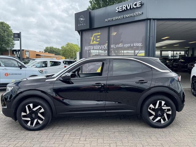 Opel MOKKA 1.2 Turbo Elegance Rijklaar | Incl. Service en garantie | AUTOMAAT | Als nieuw! | Trekhaak | Camera | Cruise | Clima | Stoelverwarming | LED | Android - Carplay | 17" LMV