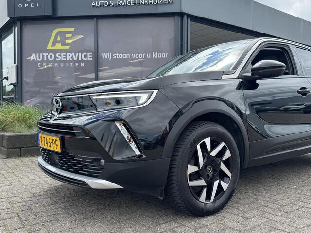 Opel MOKKA 1.2 Turbo Elegance Rijklaar | Incl. Service en garantie | AUTOMAAT | Als nieuw! | Trekhaak | Camera | Cruise | Clima | Stoelverwarming | LED | Android - Carplay | 17" LMV