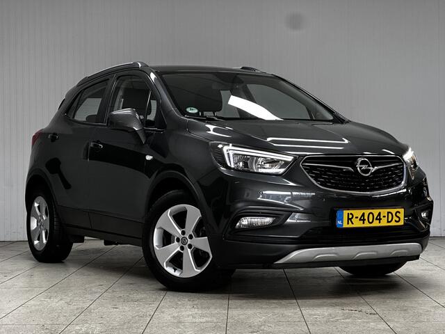 Opel MOKKA X 1.4 Turbo Innovation/ 140pk!/ Trekhaak/ 17'' LMV/ PDC V+A/ Apple + Android/ Navi/ Clima/ Cruise/ Bluetooth/ Armsteun/ Multi. LEDER. Stuur/ Mistl./ Dakrails/ LED Dagrijverl.