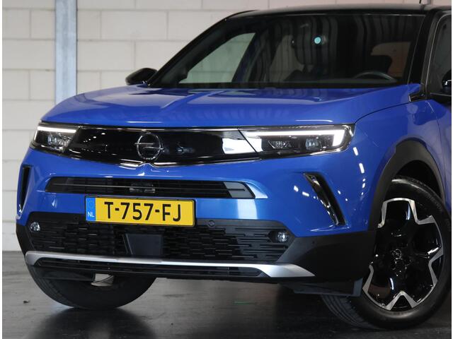Opel MOKKA Mokka-e Ultimate 50kWh 136PK | 1ste eigenaar | ACCU 96% | Massagestoel | Winterpakket | LEER/Alcantara | Navigatie | Camera | Dodehoekdetectie | Adaptive Cruise Control | Climate Control | AppleCarplay/AndroidAuto | Isofix | Privacy Glass | Two-Tone |