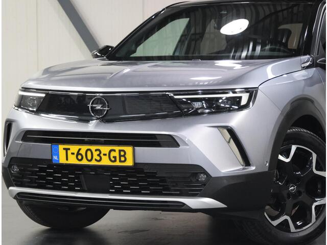 Opel MOKKA 130PK Ultimate | AppleCarPlay/AndroidAuto | Camera | Dodehoekdetectie | Stuur/stoelverwarming | AUTOMAAT | Alcantara/Leer | Two-tone | Adaptief Cruise Control | Keyless | Isofix | Privacy Glass | Trekhaak |